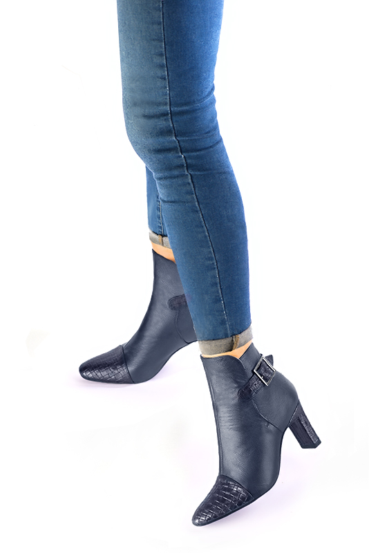 Navy blue women's ankle boots with buckles at the back. Round toe. High comma heels. Worn view - Florence KOOIJMAN